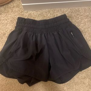 black lululemon tracker shorts